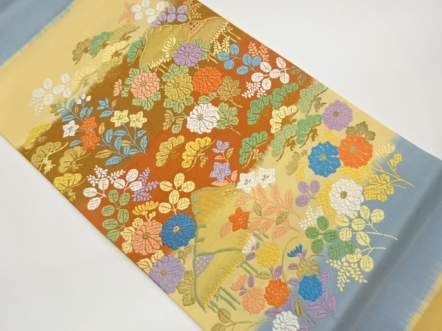 横段に秋草・松模様織出し袋帯